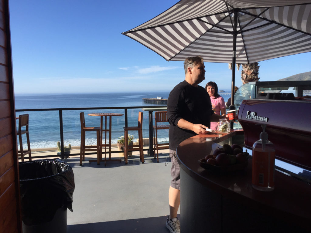 Andy getting our free hotel breakfast at Joe Mommas Coffee Rooftop Sundeck Cafe Inn at Avila Beach Those Someday Goals