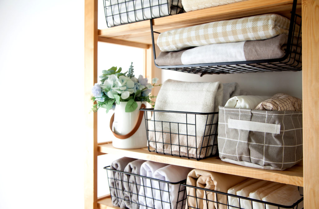 home organizing organizational bins linen shelves wire and fabric bins storage containers Those Someday Goals