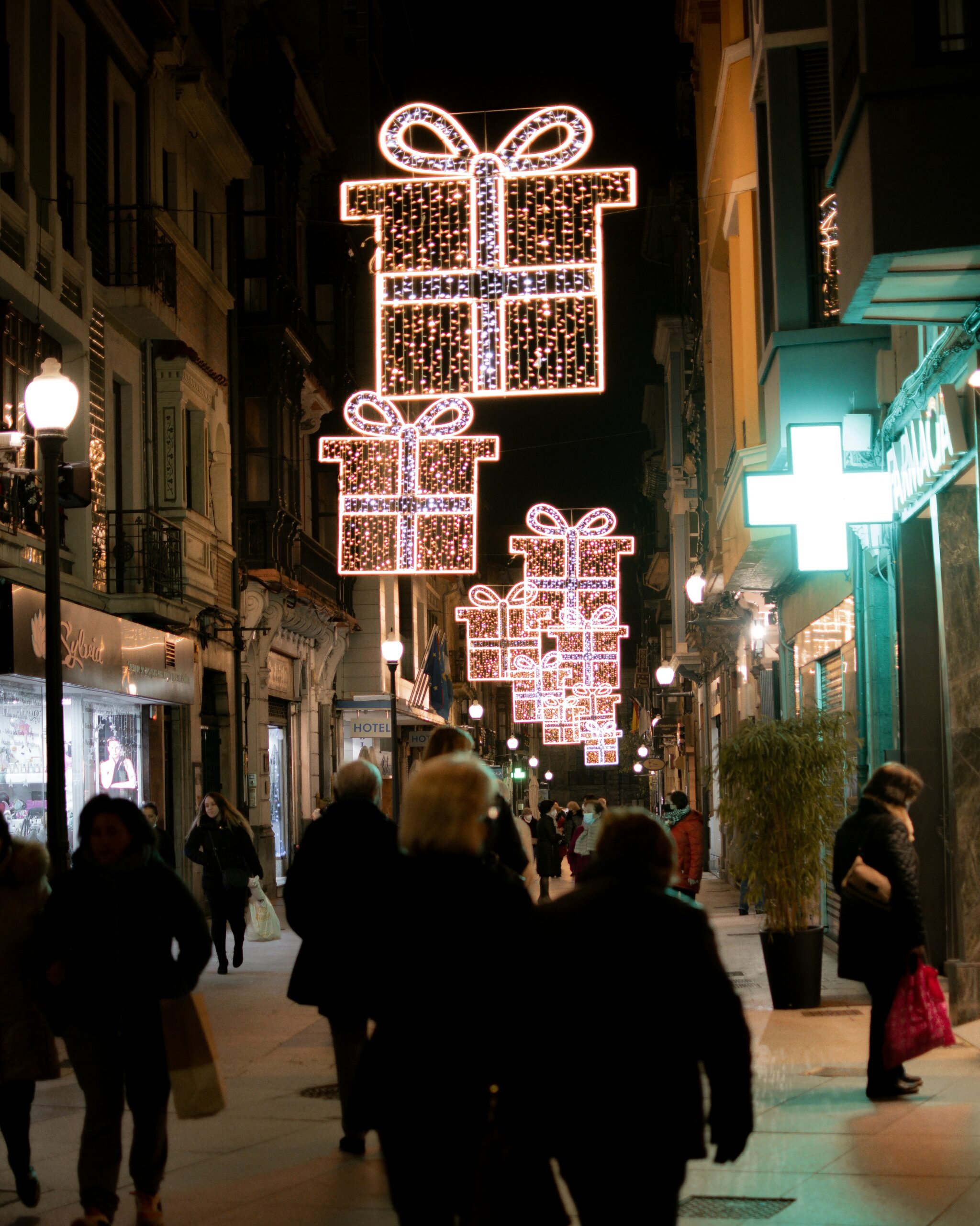 Lucía Garó shopping street holiday decorations Christmas lights shopping Unsplash