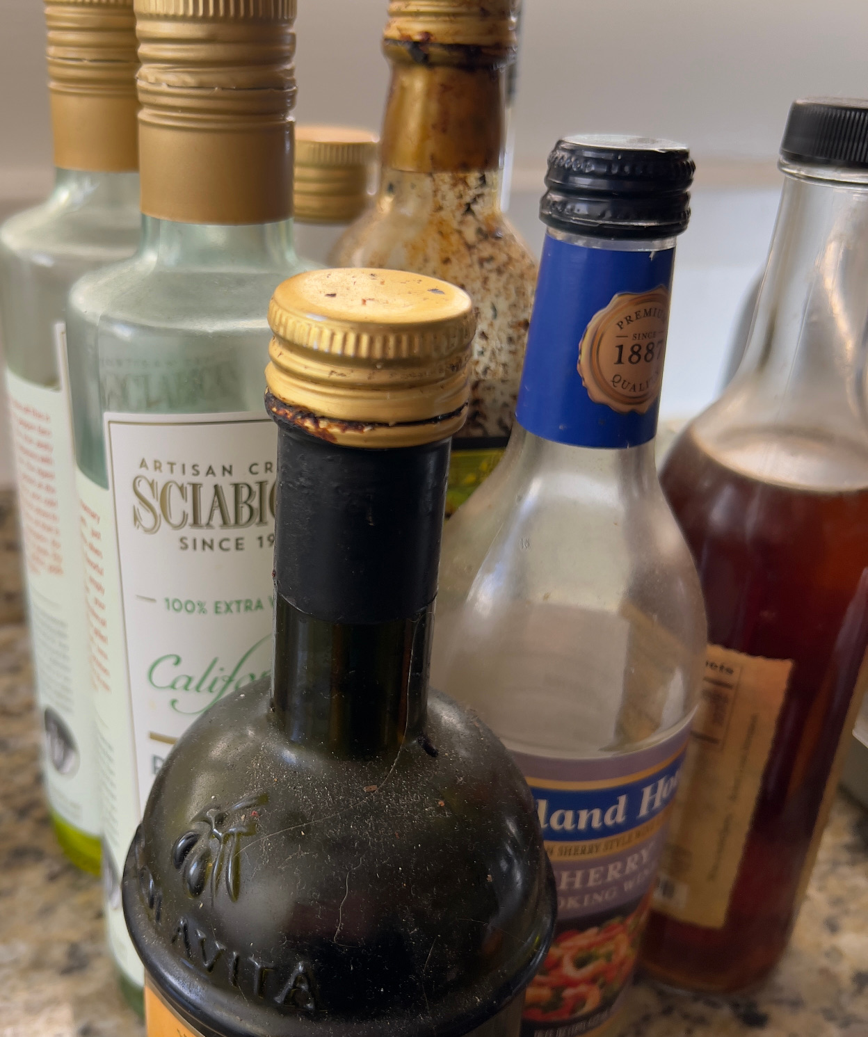 Cooking oils, vinegar, sherry, balsamic bottles, 30-day decluttering challenge, decluttering your home quickly, declutter home fast, Those Someday Goals